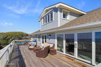 This oceanfront 4-bedroom plus flex, 4.5-bath, home sits on a - photo 49