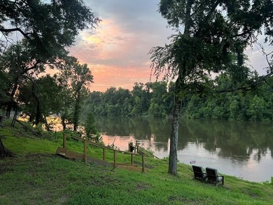 Enjoy riverfront living at its best in this completely renovated - photo 2