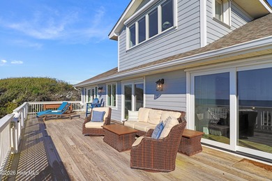 This oceanfront 4-bedroom plus flex, 4.5-bath, home sits on a - photo 53