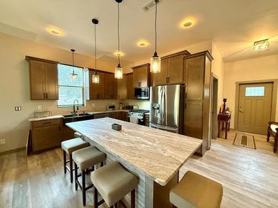 Enjoy riverfront living at its best in this completely renovated - photo 5