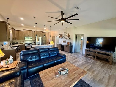 Enjoy riverfront living at its best in this completely renovated - photo 6