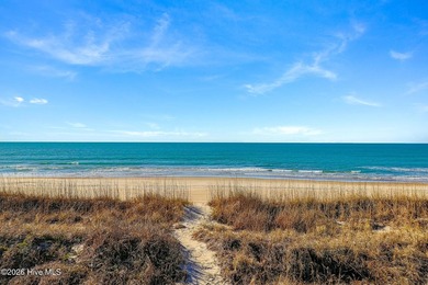 This oceanfront 4-bedroom plus flex, 4.5-bath, home sits on a - photo 57