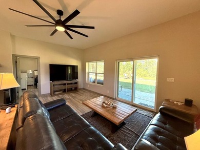 Enjoy riverfront living at its best in this completely renovated - photo 8