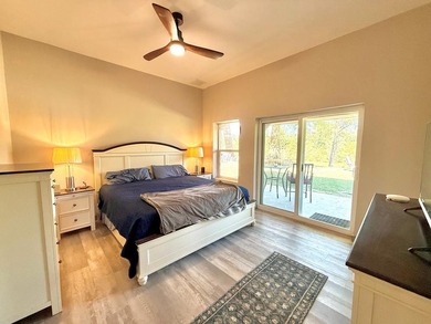 Enjoy riverfront living at its best in this completely renovated - photo 9
