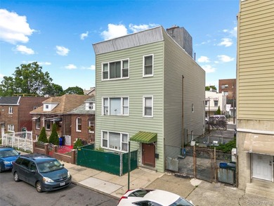 Great opportunity to own a spacious three-family home in the Van - photo 3