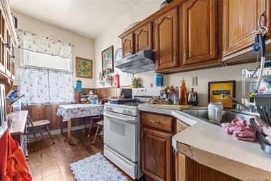 Great opportunity to own a spacious three-family home in the Van - photo 8