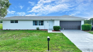 Lake Home For Sale in Lehigh Acres, Florida