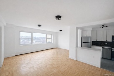 Sun-Filled Two-Bedroom with Tranquil Water Views Welcome to this - photo 6