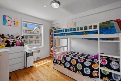 Fabulous top floor 2 bedroom unit close to the new bustling - photo 13