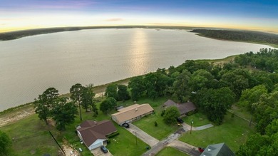 Welcome to this charming ranch-style brick home nestled on a - photo 3