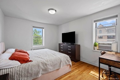 Fabulous top floor 2 bedroom unit close to the new bustling - photo 14