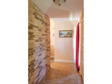 Welcome to this charming ranch-style brick home nestled on a - photo 4
