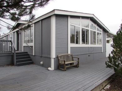 Large double wide mobile home with privacy on a corner lot and