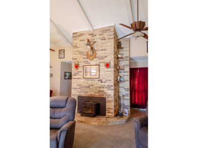 Welcome to this charming ranch-style brick home nestled on a - photo 10