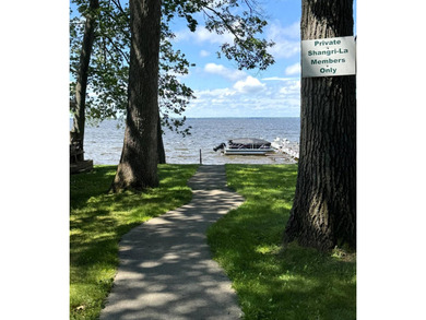 Enjoy 150' of shared sandy lakefront on beautiful Houghton - photo 28