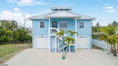 Welcome to your dream coastal getaway at 103 Tropical Shore - photo 1