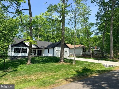 Nestled in the prestigious Lake of the Woods community, this - photo 8