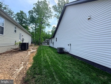 Nestled in the prestigious Lake of the Woods community, this - photo 9