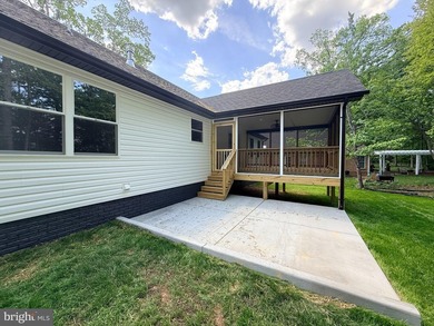 Nestled in the prestigious Lake of the Woods community, this - photo 10