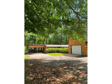 Lakefront Opportunity with Endless Potential! This 3-bedroom - photo 1
