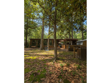 Lakefront Opportunity with Endless Potential! This 3-bedroom - photo 2