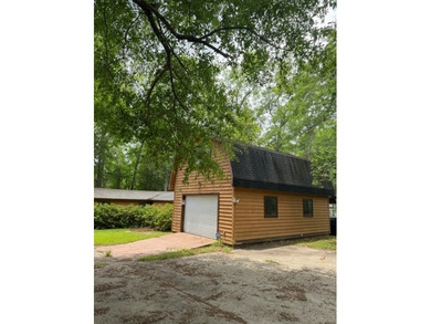 Lakefront Opportunity with Endless Potential! This 3-bedroom - photo 4