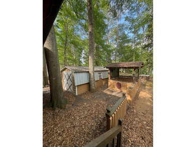Lakefront Opportunity with Endless Potential! This 3-bedroom - photo 5