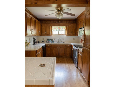 Lakefront Opportunity with Endless Potential! This 3-bedroom - photo 9