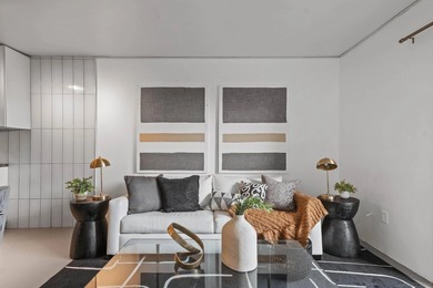 Light and bright, this move-in ready unit is filled with natural - photo 3
