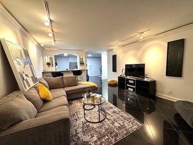 Located in the prestigious Hudson Harbour Condominiums, a