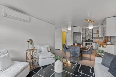 Light and bright, this move-in ready unit is filled with natural - photo 6