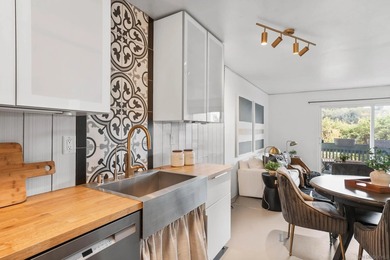 Light and bright, this move-in ready unit is filled with natural - photo 10