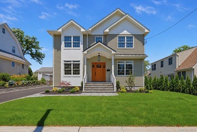 This stunning new construction residence, located in the highly - photo 1