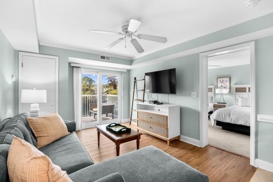 Coastal living awaits at 213 Summerhouse in Litchfield By The - photo 13