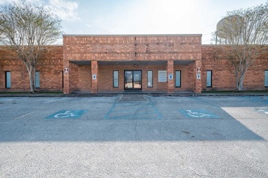 Large commercial building with 63 rooms, 4 restrooms, large