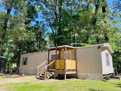 Tucked away near the Texas/Louisiana line in the desirable - photo 3