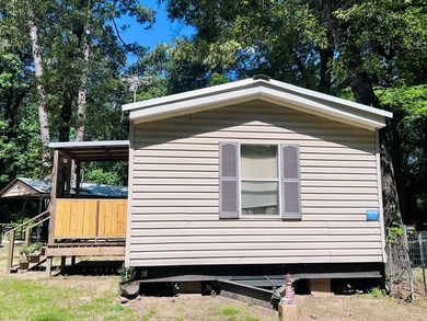 Tucked away near the Texas/Louisiana line in the desirable - photo 4