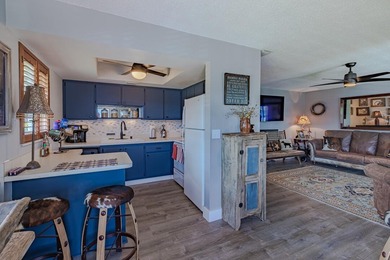 Beautifully updated 2BD/2BA corner residence featuring impact - photo 8