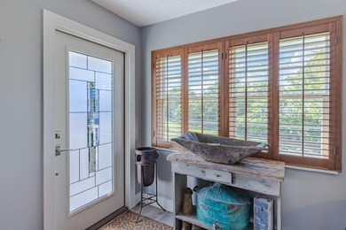 Beautifully updated 2BD/2BA corner residence featuring impact - photo 9