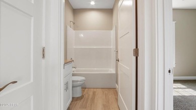 This adorable new construction is close to restaurants, shopping - photo 12