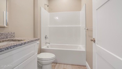 This adorable new construction is close to restaurants, shopping - photo 13