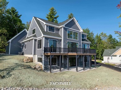 Experience life at the lake with this exquisite custom-built - photo 2