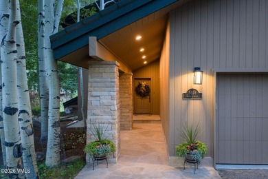 Strategically positioned along the banks of Gore Creek, this - photo 2