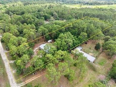 Tucked away on 2.13 private acres in the heart of Homosassa - photo 3
