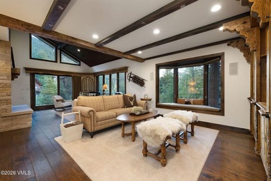 Strategically positioned along the banks of Gore Creek, this - photo 4