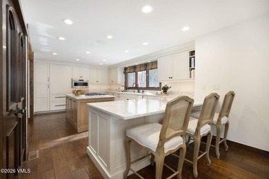 Strategically positioned along the banks of Gore Creek, this - photo 8
