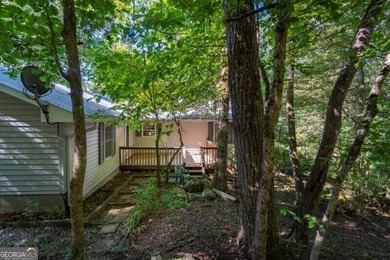 What a rare gem! Imagine 4 wooded and private acres, 750ft - photo 11