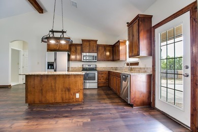 Discover this charming 3-bedroom, 2-bathroom home located in the - photo 11
