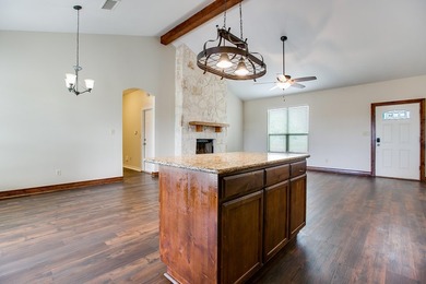 Discover this charming 3-bedroom, 2-bathroom home located in the - photo 12