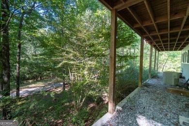What a rare gem! Imagine 4 wooded and private acres, 750ft - photo 16